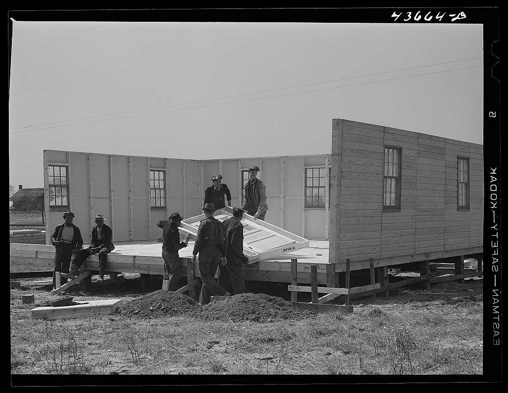 assembling-the-fourth-wall-of-a-prefabricated-house.jpg