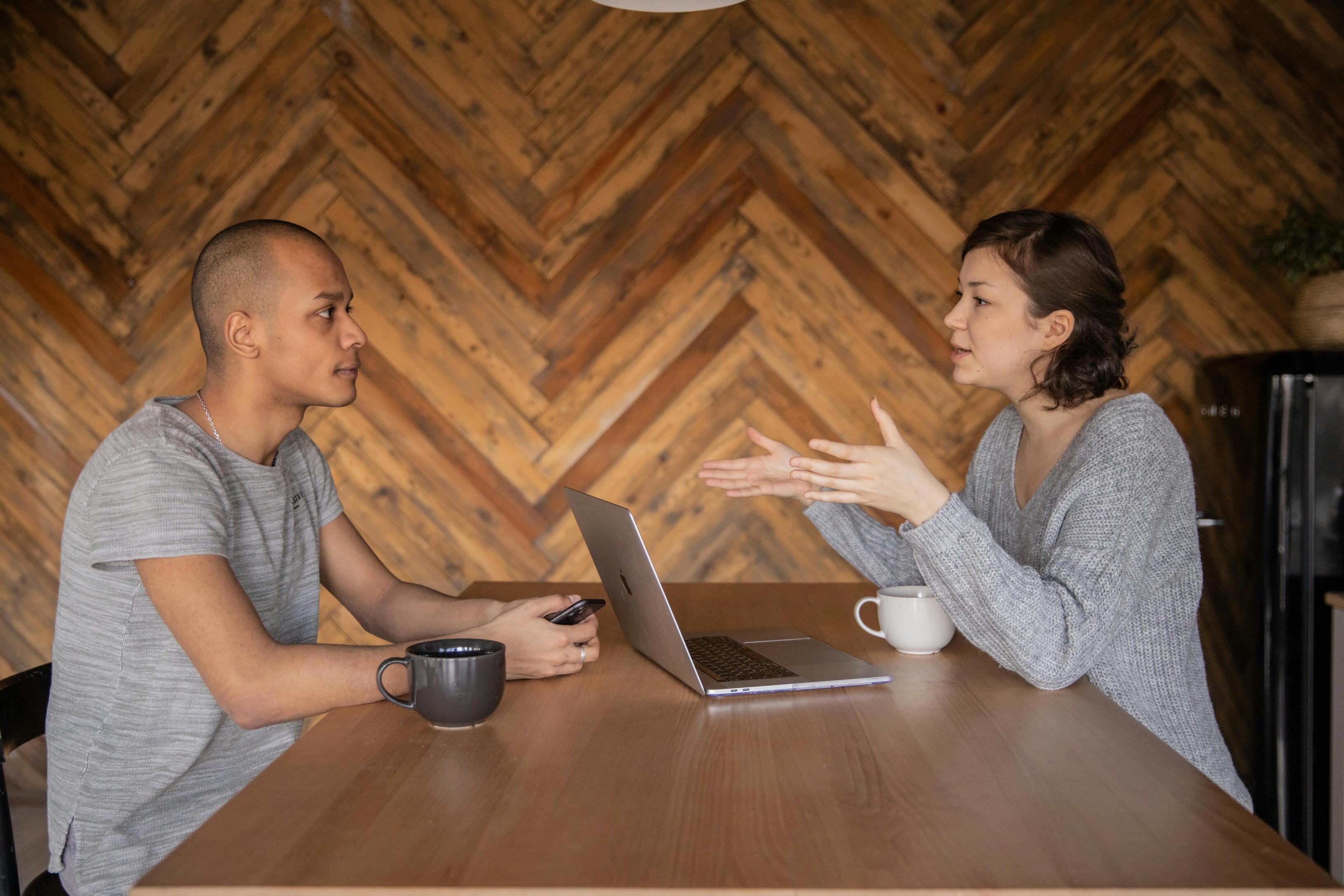 woman-and-male-talk-at-the-table.jpg